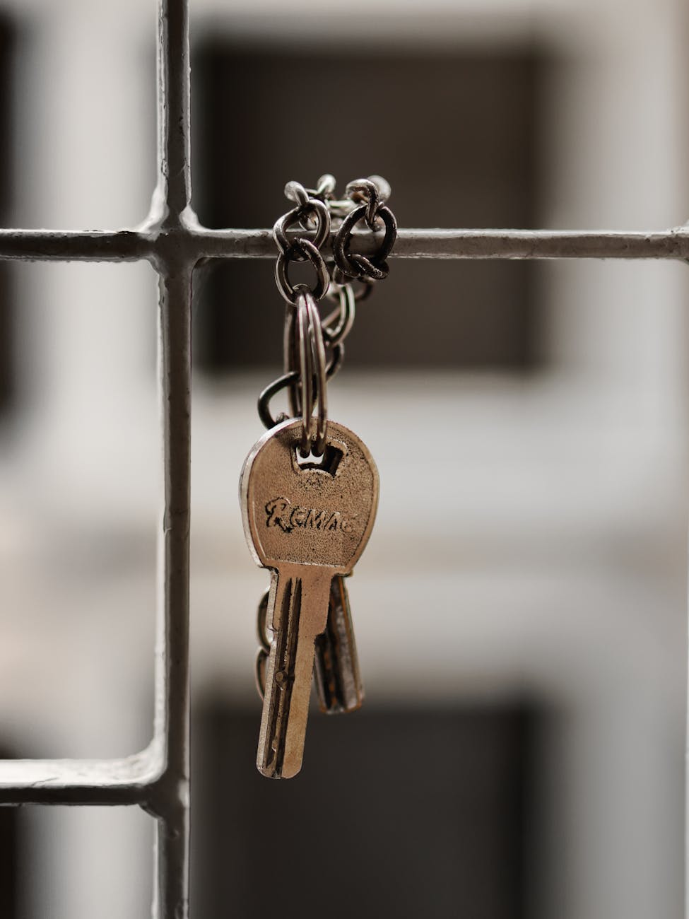 keys hanging on a grill